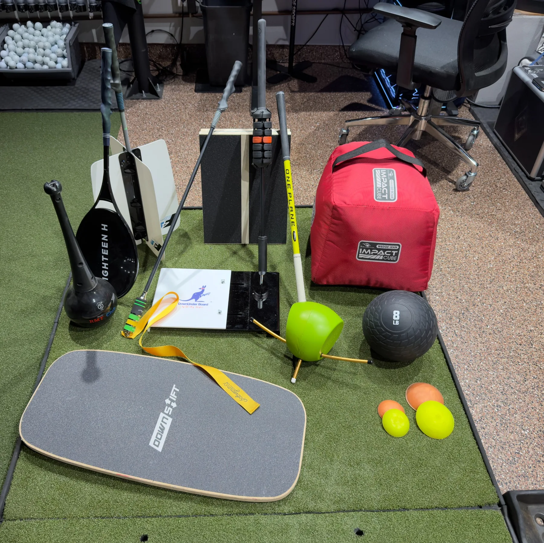 Golf training aids used at Perfectly Fit Golf to help students understand swing changes